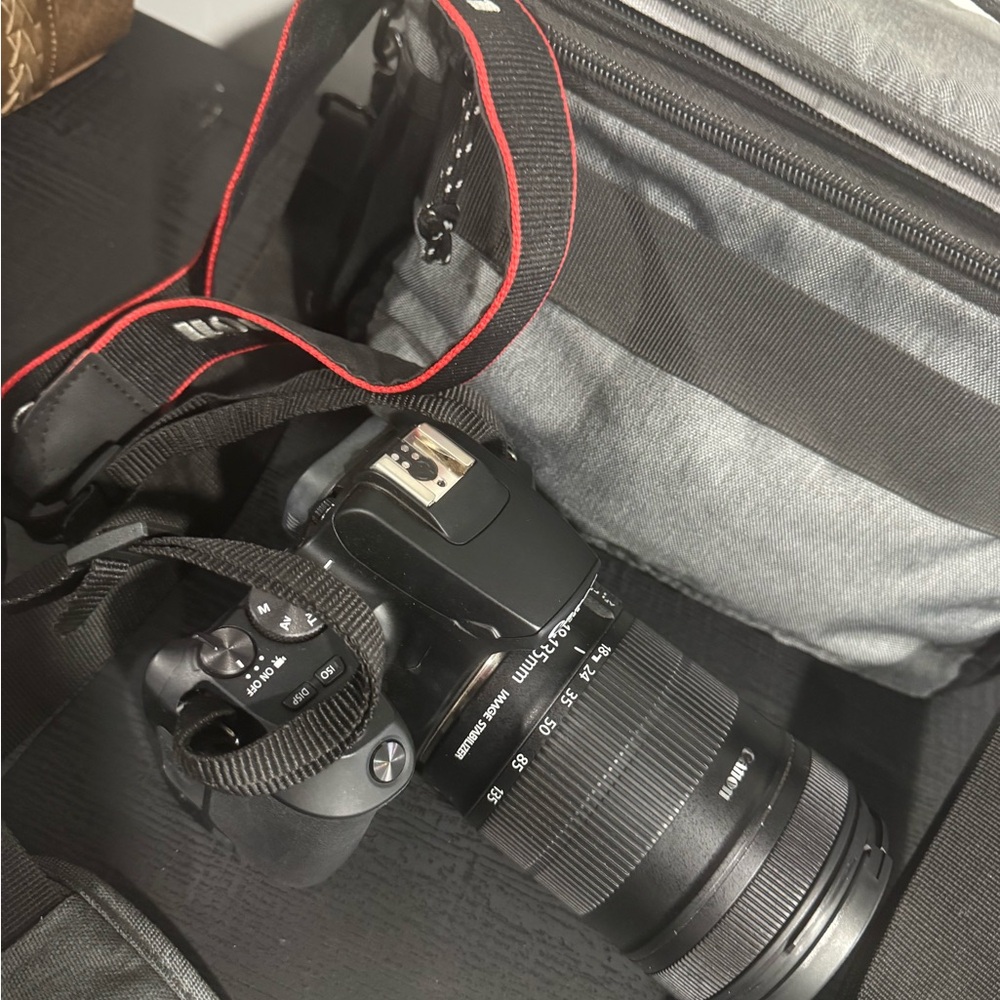 Canon Black DSLR Camera with Gray Bag